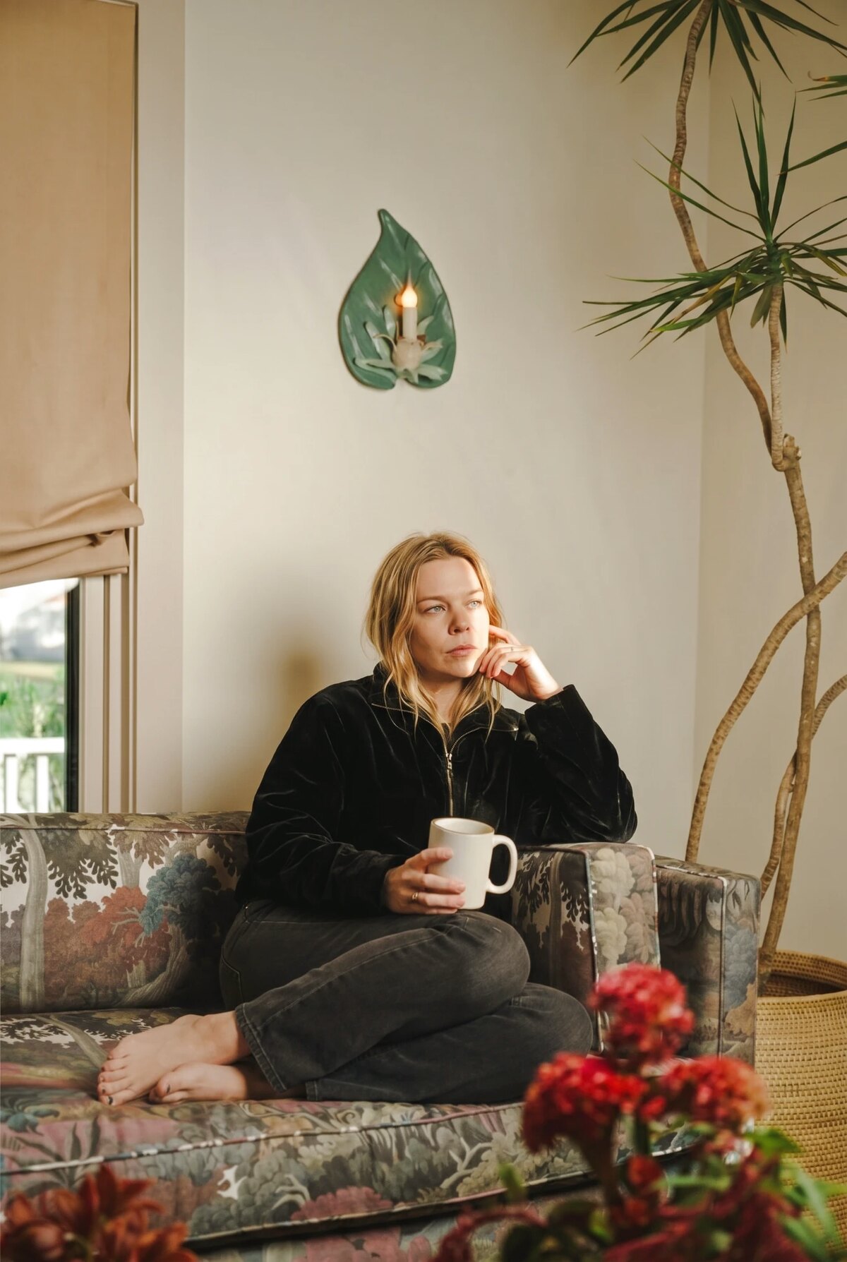 Lauren Hofstee at home with a cup of tea
