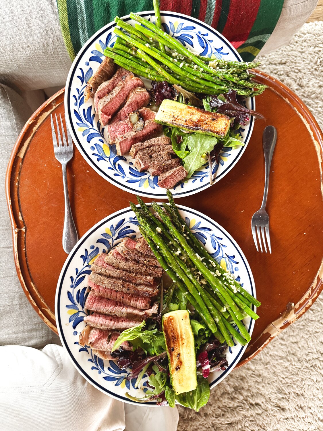 A hearty bowl with steak, asparagus and greens