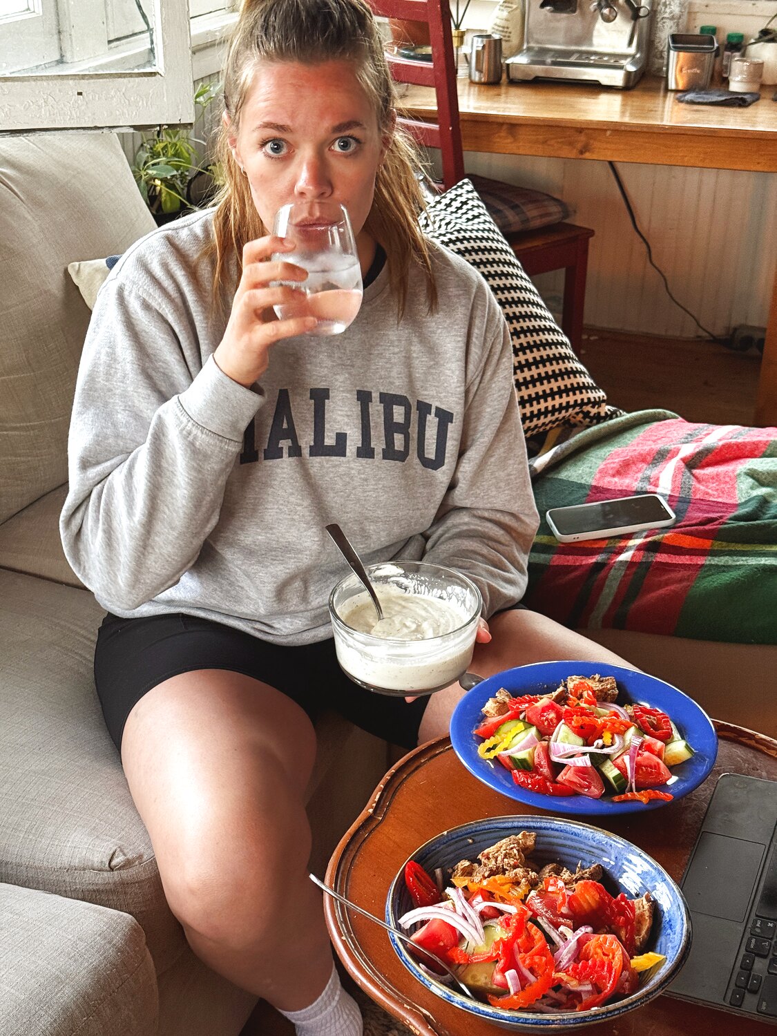 A comfortable moment with a bowl and a side salad
